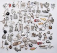 COLLECTION OF SILVER AND WHITE METAL CHARMS AND PENDANTS