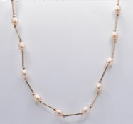 9CT GOLD AND CULTURED PEARL NECKLACE