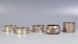 GROUP OF FIVE SILVER HALLMARKED NAPKIN RINGS.