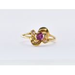 18CT GOLD RUBY AND DIAMOND RING