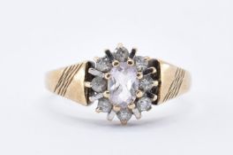 HALLMARKED 9CT GOLD WHITE STONE CLUSTER RING.