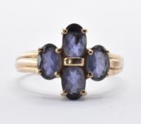 9CT GOLD AND PURPLE FOUR STONE RING