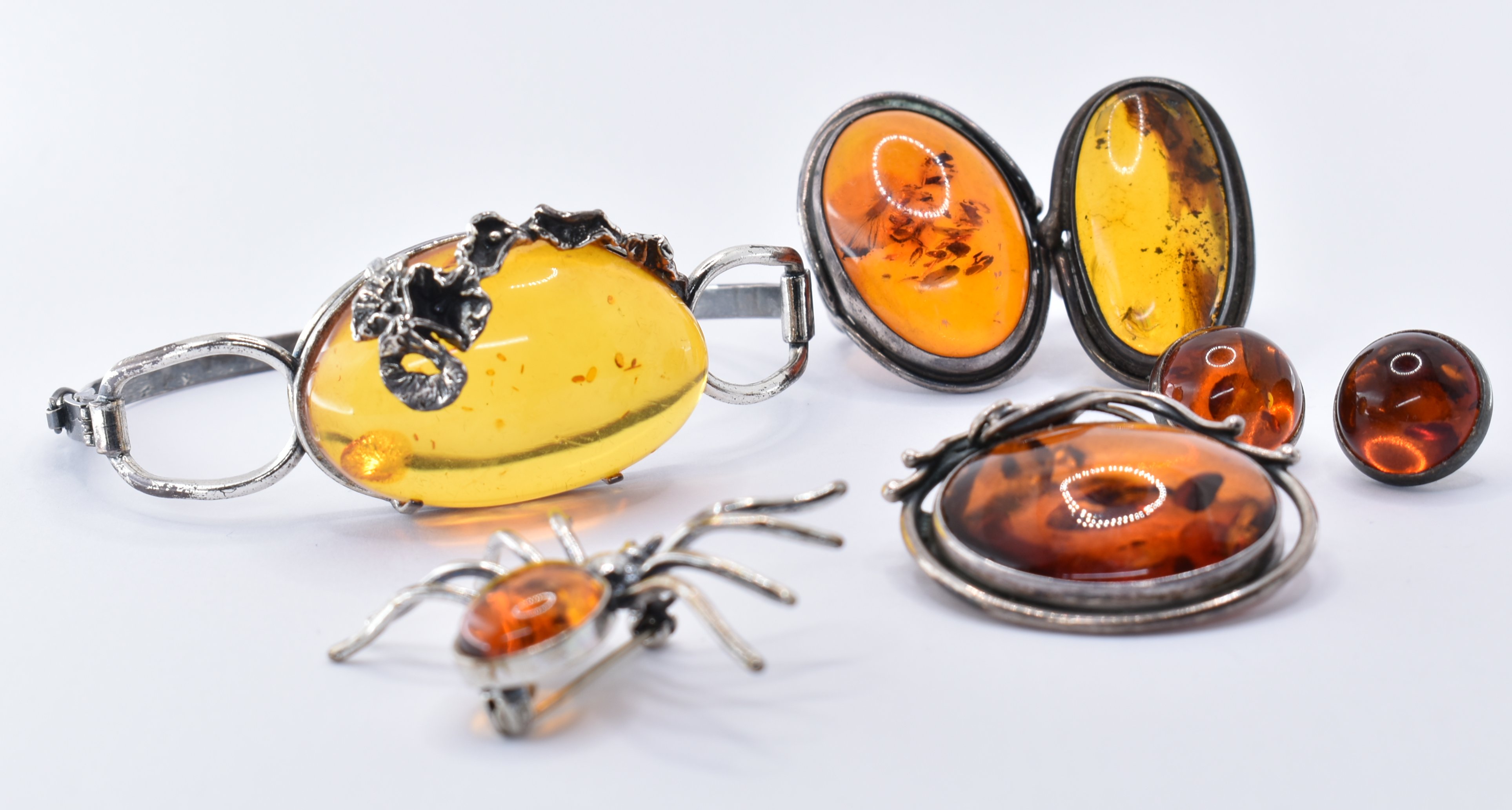 COLLECTION OF SILVER AND AMBER JEWELLERY