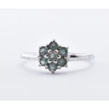 9CT WHITE GOLD AND GREEN STONE CLUSTER RING