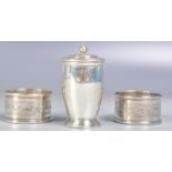 PAIR OF SILVER NAPKIN RINGS AND SILVER PEPPER POT