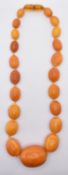 20TH CENTURY BUTTERSCOTCH AMBER BEADED NECKLACE