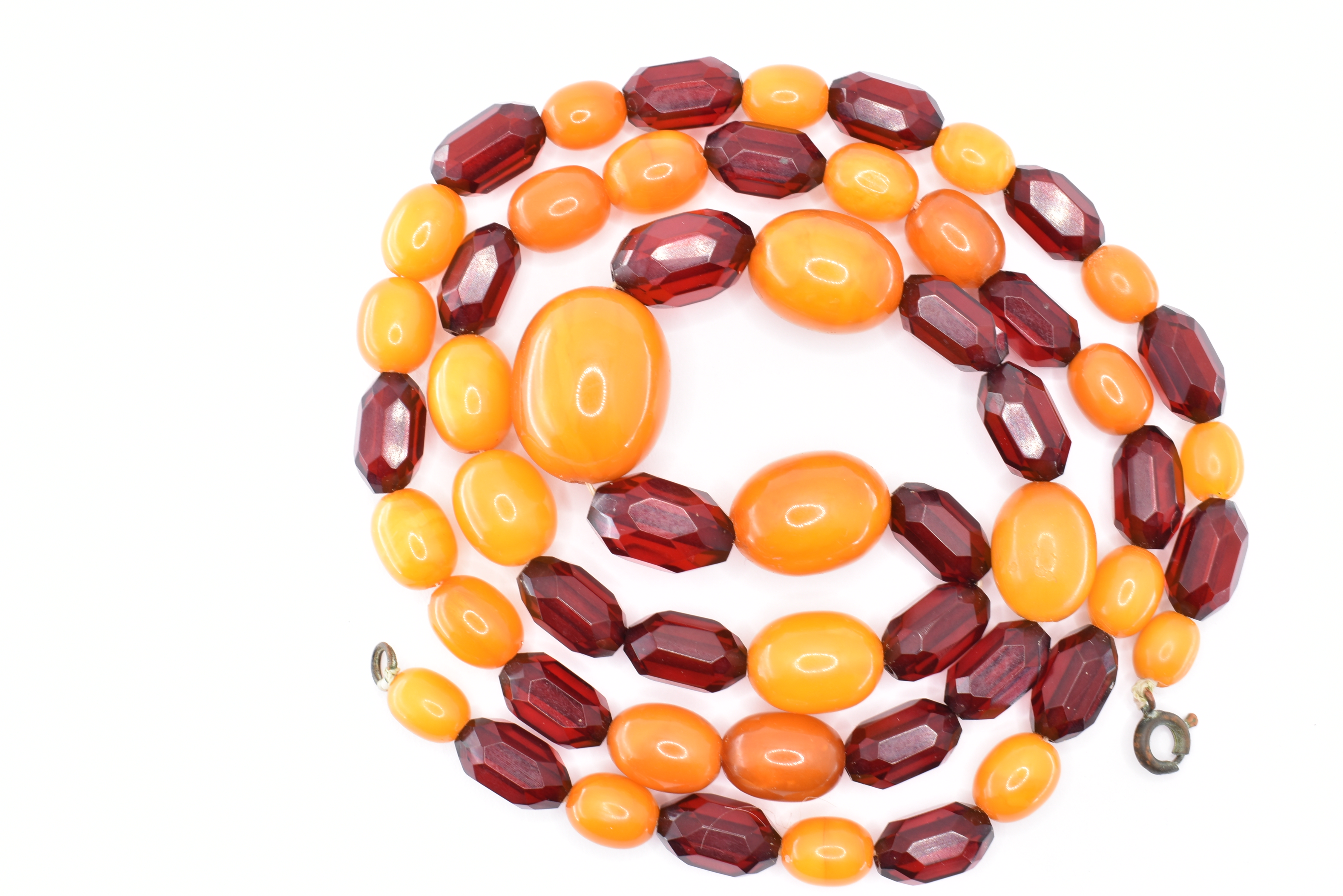 20TH CENTURY AMBER AND CHERRY BEAD NECKLACES