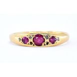 18CT GOLD THREE STONE RUBY RING