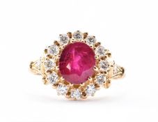 18CT GOLD RUBY & DIAMOND CLUSTER RING