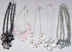 SIX BUTLER & WILSON FLORAL NECKLACES