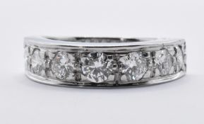 18CT WHITE GOLD AND DIAMOND HALF ETERNITY RING