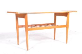 MID CENTURY TEAK COFFEE TABLE ON TEAK SUPPORTS