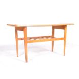 MID CENTURY TEAK COFFEE TABLE ON TEAK SUPPORTS