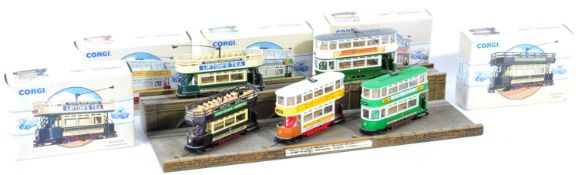 COLLECTION OF CORGI BRITISH TRAMS AND DIORAMA STAND