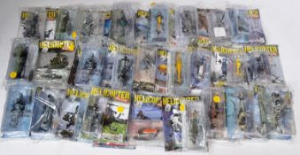 COLLECTION OF ASSORTED HELICOPTER DIECAST AND MAGAZINES