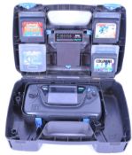 SEGA MADE GAME GEAR CONSOLE WITH GAMES AND ACCESSORIES.