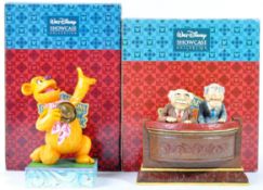 TWO ENESCO MADE WALT DISNEY SHOWCASE FIGURINES