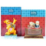 TWO ENESCO MADE WALT DISNEY SHOWCASE FIGURINES