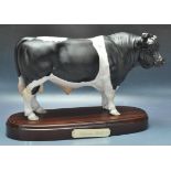 ROYAL DOULTON FRIESIAN BULL FIGURINE.