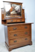 A CIRCA 1900S ART AND CRAFTS OAK DRESSING TABLE CHEST