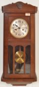 20TH CENTURY CIRCA 1940S OAK WALL CLOCK