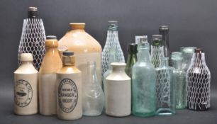 LARGE COLLECTION OF GLASS BOTTLES AND STONEWARE BOTTLES