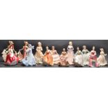 COLLECTION OF NINE VINTAGE 20TH CENTURY CHINA FIGURINES