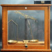 VINTAGE 20TH CENTURY GLASS AND OAK CASED BALANCE SCALE