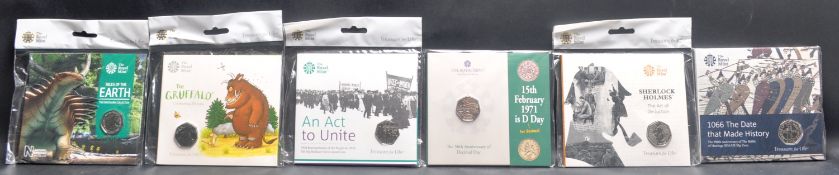 ROYAL MINT - COLLECTION OF UNCIRCULATED PRESENTATION 50P COINS