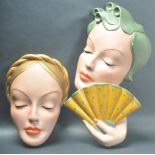 PAIR OF MID 20TH CENTURY ART DECO STYLE CERAMIC WALL PLAQUES