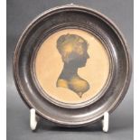 VICTORIAN MINIATURE SILHOUETTE PORTRAIT OF A FEMALE SITTER.