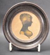 VICTORIAN MINIATURE SILHOUETTE PORTRAIT OF A FEMALE SITTER.