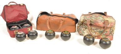 COLLECTION OF TWELVE VINTAGE 20TH CENTURY LAWN BOWLS