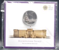 THE ROYAL MINT - £100 BUCKINGHAM PALACE SILVER COIN