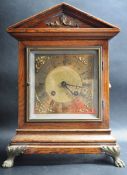 EARLY 20TH CENTURY OAK CASED 8 DAY MANTEL CLOCK OF ARCHITECTURAL FORM