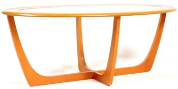 MID 20TH CENTURY MELAMINE AND GLASS COFFEE TABLE IN THE MANNER OF G-PLAN