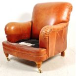 CONTEMPORARY BROWN LEATHER ARMCHAIR IN THE MANNER OF HOWARD