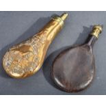 TWO 19TH CENTURY BRASS AND LEATHER POWDER FLASKS