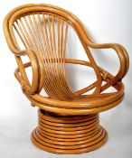 1970'S BAMBOO AND WICKER / CANE SWIVEL EGG ARMCHAIR