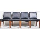 MATCHING SET OF EIGHT TEAK AND BLACK LEATHER DINING CHAIRS