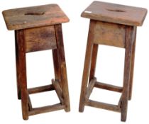 PAIR OF EARLY 20TH CENTURY ELM WORKSHOP STOOLS