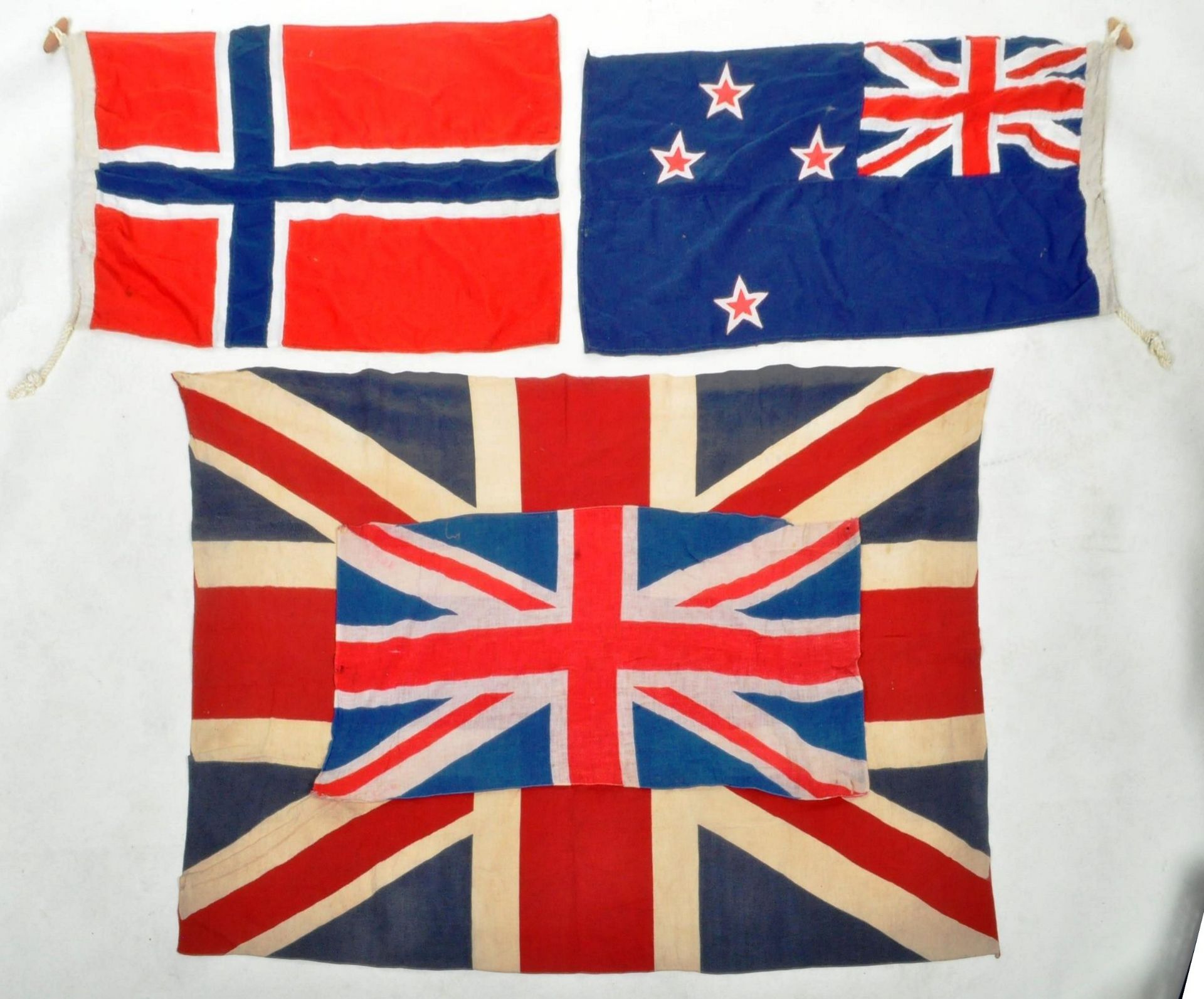 COLLECTION OF FOUR VINTAGE WORLD FLAGS