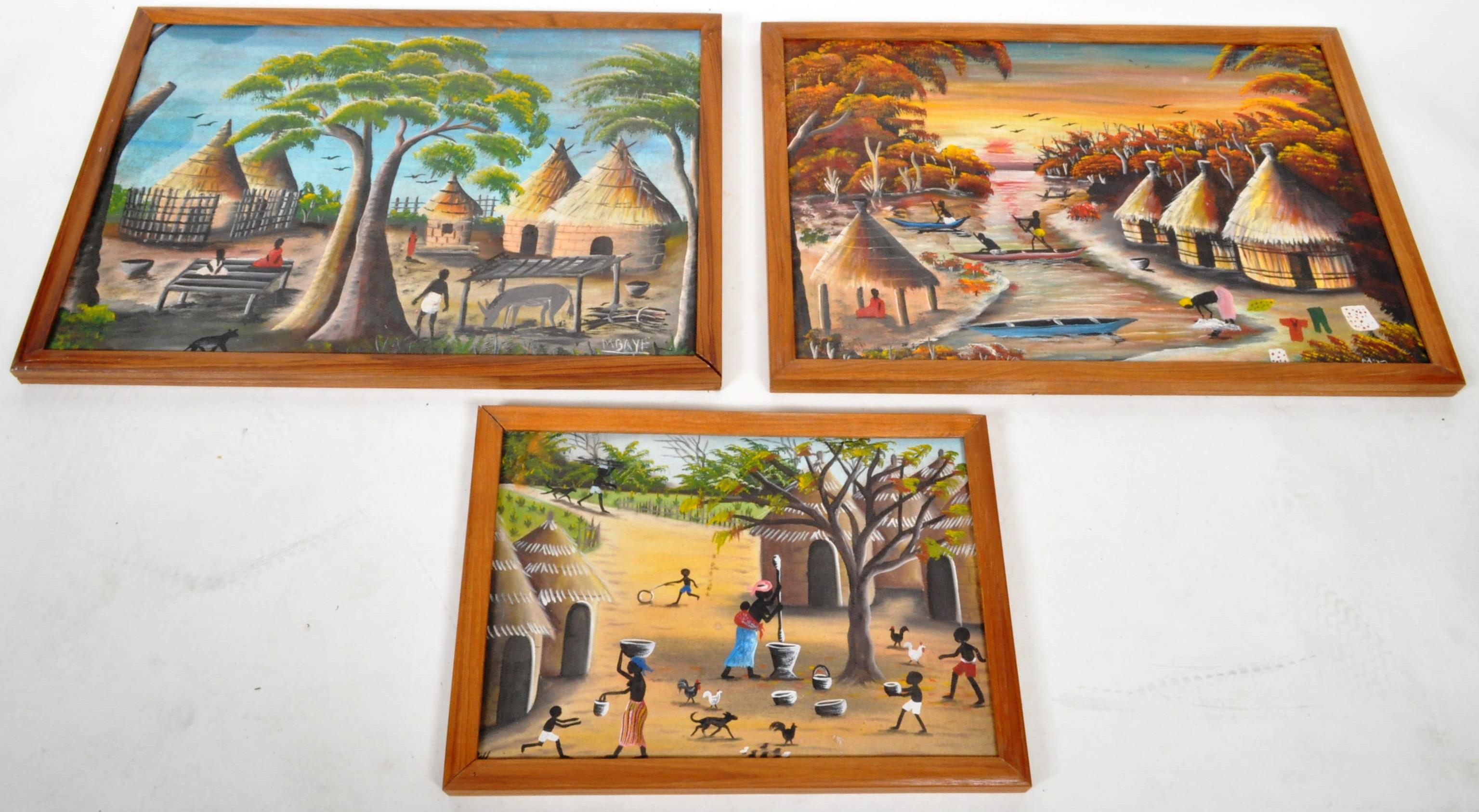 SET OF THREE AFRICAN OIL ON CANVAS TRIBAL VILLAGE PAINTINGS - Image 2 of 7