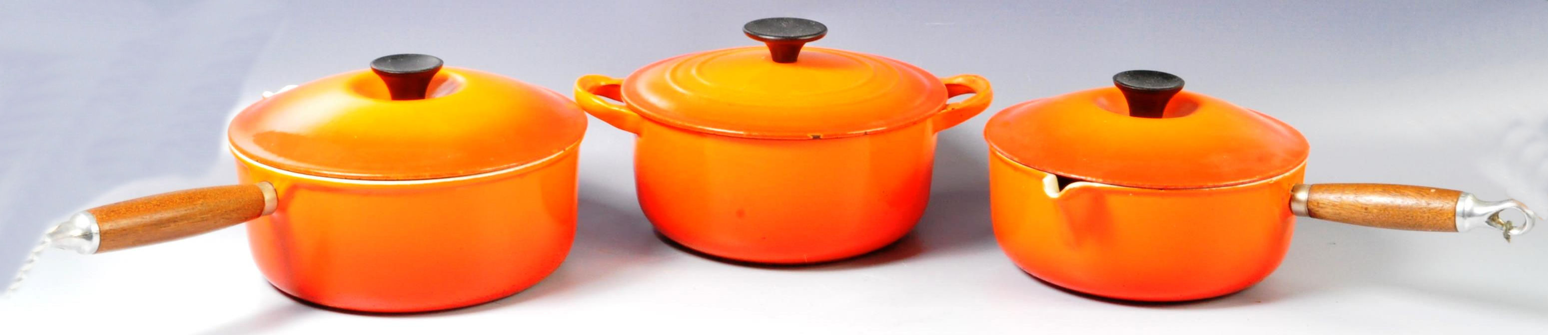 LE CREUSET - SELECTION OF THREE CAST IRON KITCHEN WARES