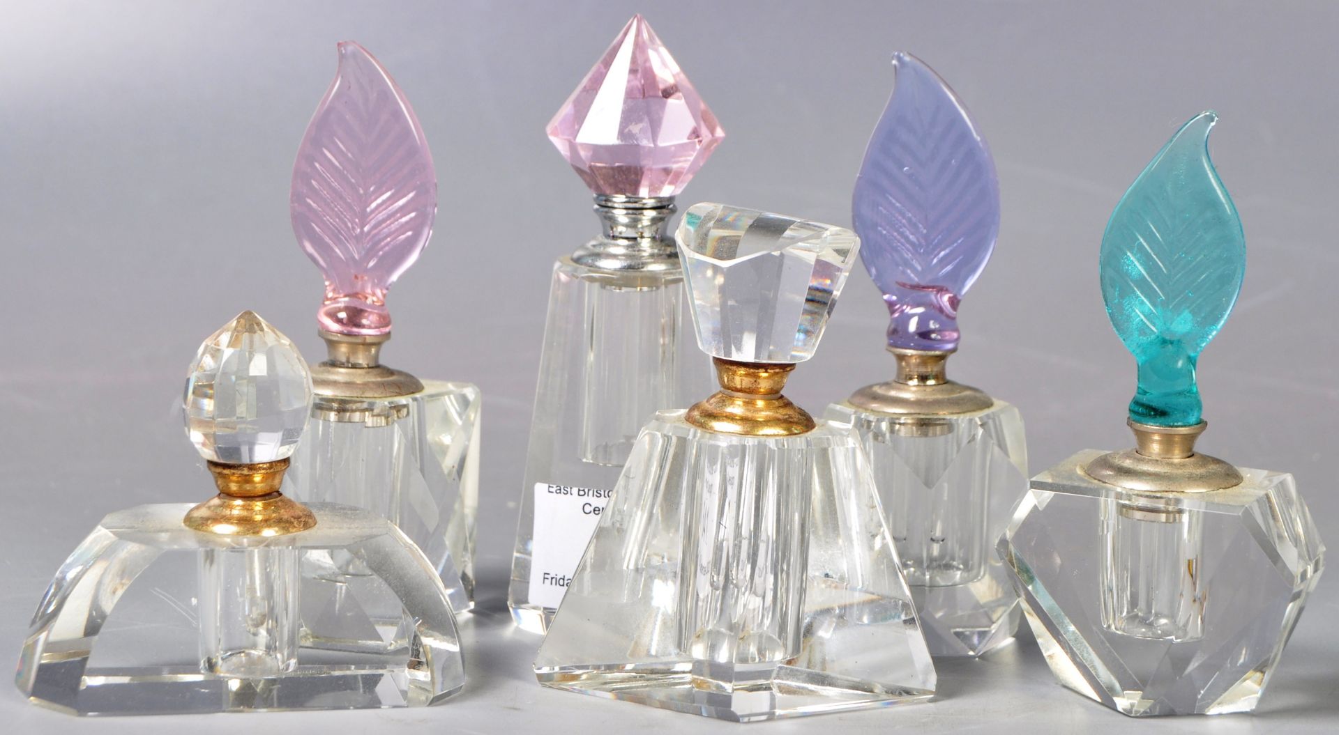 COLLECTION OF ART DECO MANNER CUT GLASS PERFUME BOTTLES