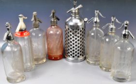 COLLECTION OF EIGHT VINTAGE GLASS SODA SIPHONS