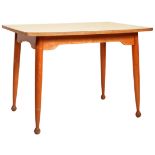 MID 20TH CENTURY BEECH AND FORMICA TOPPED DINING TABLE