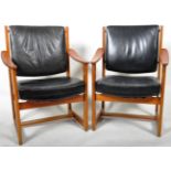 SVEN KAI-LARSEN FOR NORDISKA KOMPANIET PAIR OF TEAK AND LEATHER CHAIRS