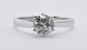 18CT WHITE GOLD AND DIAMOND SOLITAIRE RING