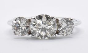 WHITE GOLD AND DIAMOND THREE STONE RING